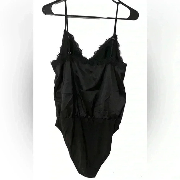 Forever 21 Tops - Forever 21 Satin Bodysuit. New without tags.